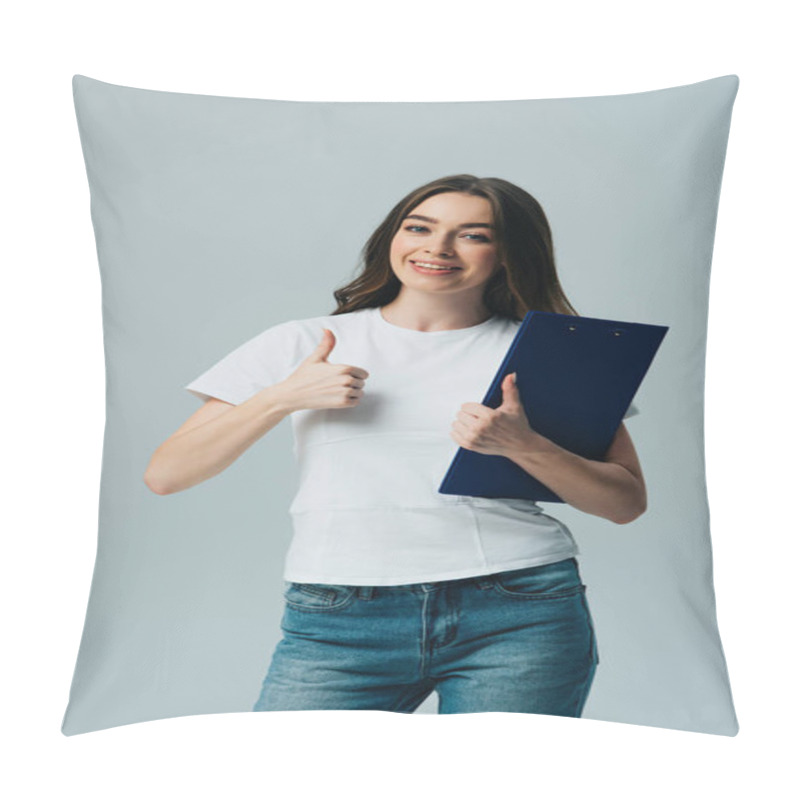 Personality  Happy Beautiful Girl In White T-shirt Holding Clipboard Showing Thumb Up Isolated On Grey Pillow Covers