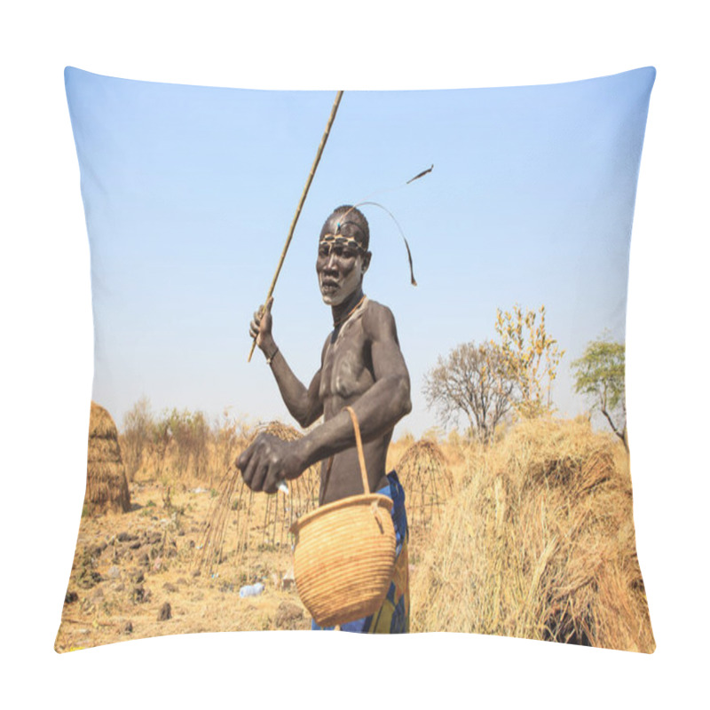 Personality  Jinka, Omo River Valley, Ethiopia - January, 2018. Agressive Mursi Tribe Man Holding A Big Stick And A Basket, Posing For Tourists Pillow Covers