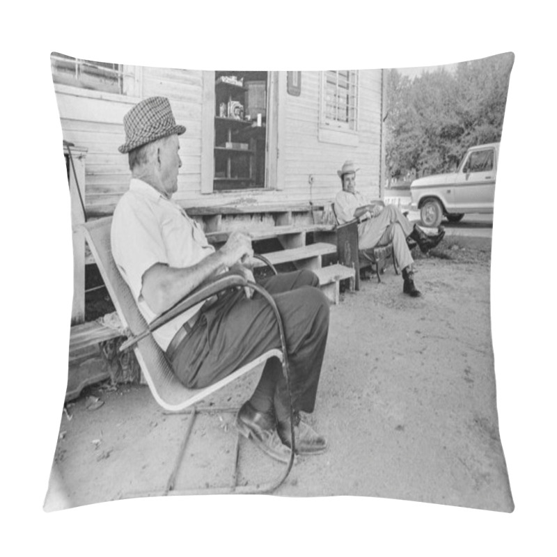 Personality  Macedonia, Arkansas, United States  June 23,  2024: Horizontal Shot Of Two Men Sitting And Talking Outside A 1970s Old Country Store. Pillow Covers