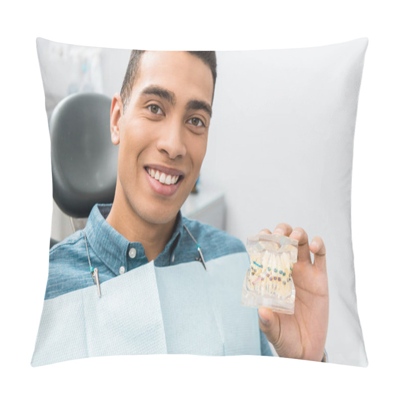 Personality  Handsome African American Man Holding Dental Jaw Model With Braces Pillow Covers