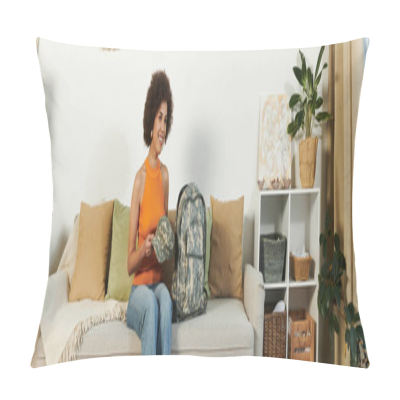 Personality  A Young Woman Enjoys A Cozy Moment In Her Living Room, Surrounded By Decor And Her Military Backpack. Pillow Covers