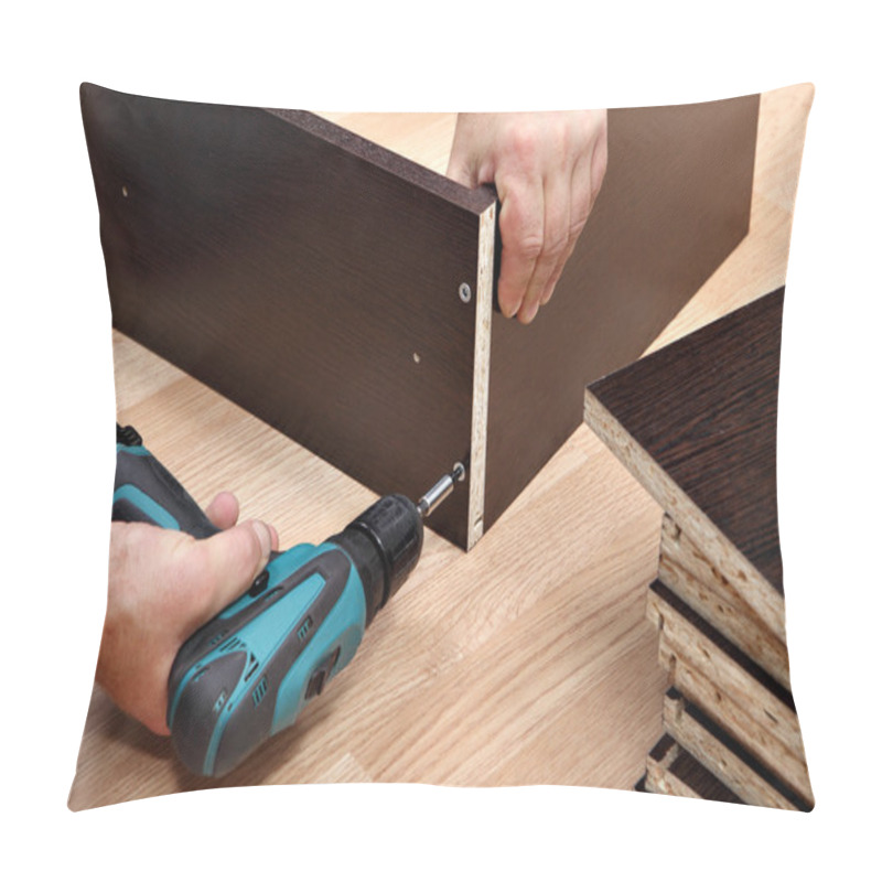 Personality  Furniture Assembly Using A Cordless Screwdriver, Close Up. Pillow Covers