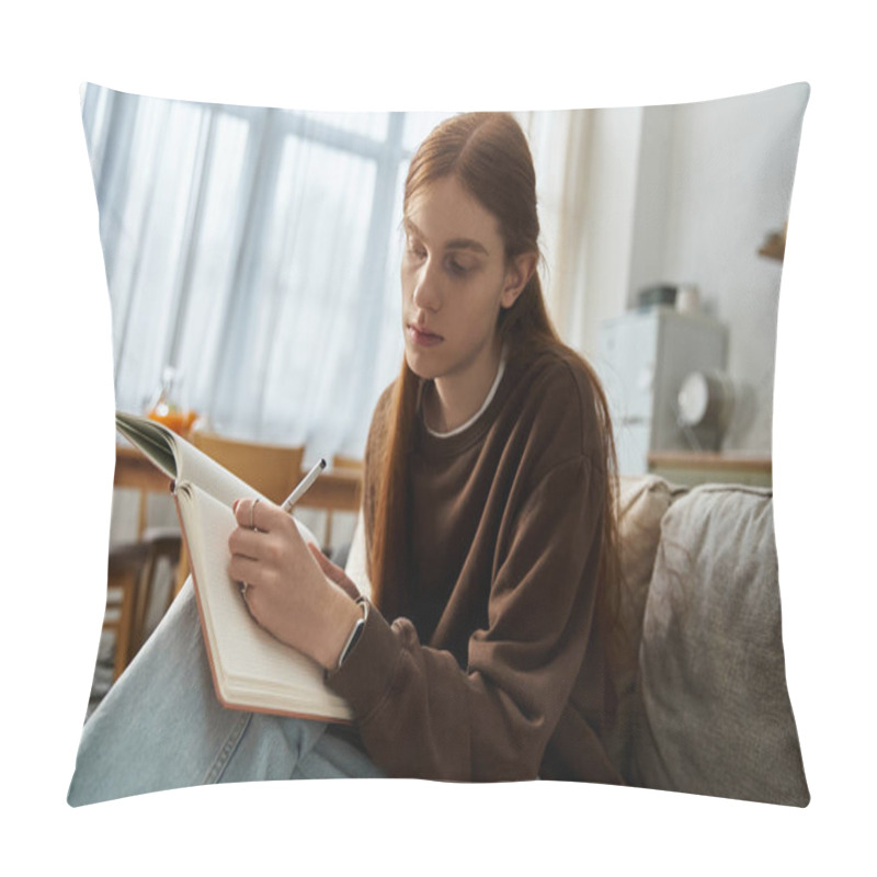 Personality  Casual Young Guy In A Sweatshirt Reflects While Writing In His Notebook At Home. Pillow Covers