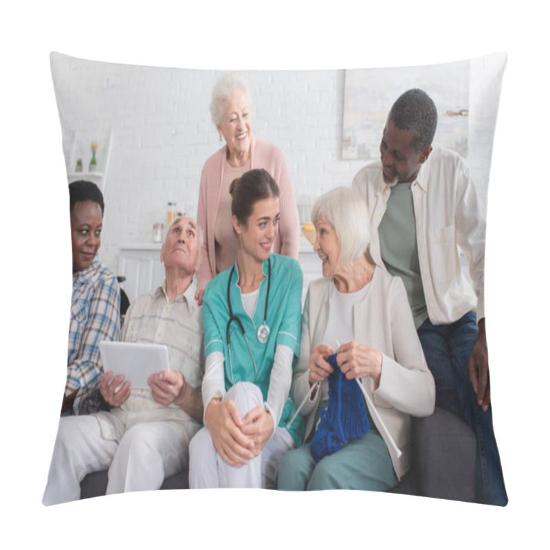 Personality  Senior Woman With Yarn Talking To Nurse Near Interracial Pensioners In Nursing Home  Pillow Covers