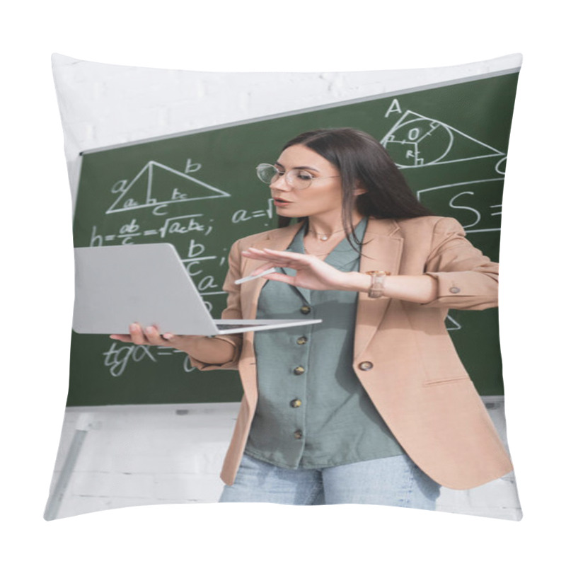 Personality  Teacher Holding Chalk And Laptop During Online Lecture Near Chalkboard In Classroom  Pillow Covers