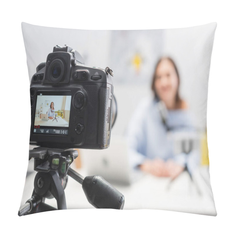 Personality  Digital Camera On Tripod Standing Near Blurred Happy Female Podcaster Using Devices And Microphone On Wooden Table During Stream In Podcast Studio  Pillow Covers