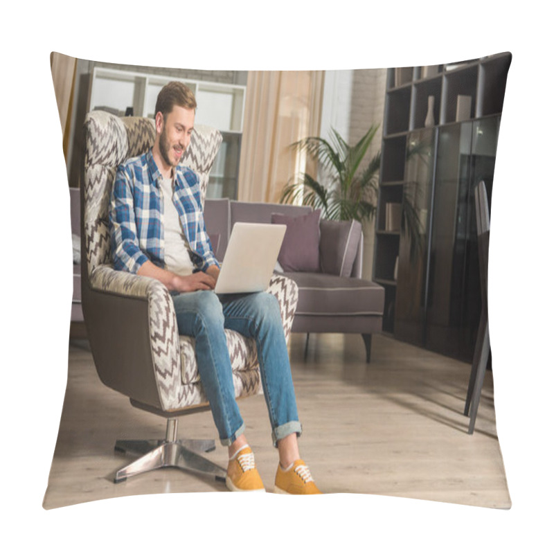 Personality  Young Male In Armchair Using Laptop In Living Room With Modern Design Pillow Covers