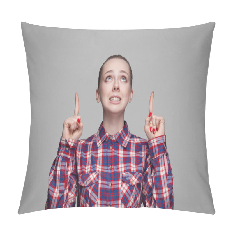 Personality  Beautiful Funny Blonde Woman In Pink Checkered Shirt With Collected Bun Hairstyle Looking And Pointing Up On Gray Background Pillow Covers