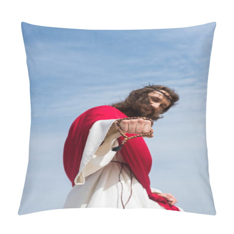 Personality  Low Angle View Of Jesus In Robe, Red Sash And Crown Of Thorns Showing Fist With Rosary Against Blue Sky Pillow Covers