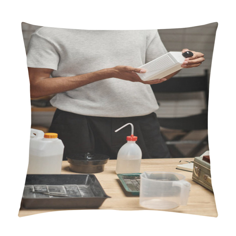 Personality  Cropped African American Photographer Checking Chemical Solution In Darkroom, Film Development Pillow Covers