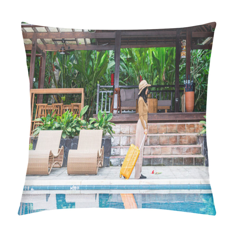 Personality  A Woman Walking By A Poolside With An Orange Suitcase, Wearing A Hat And Stylish Outfit. The Background Features Lush Greenery And A Wooden Structure, Creating A Tropical Vacation Vibe. Pillow Covers