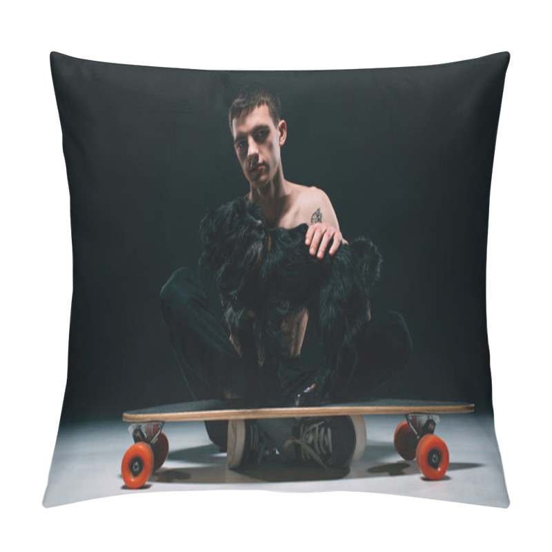 Personality  Man With Tattoos Stroking Black Dog On Longboard On Dark Background Pillow Covers