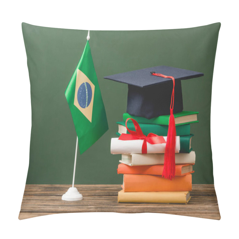 Personality  Books, Academic Cap, Diploma And Brazilian Flag On Wooden Surface Isolated On Green Pillow Covers