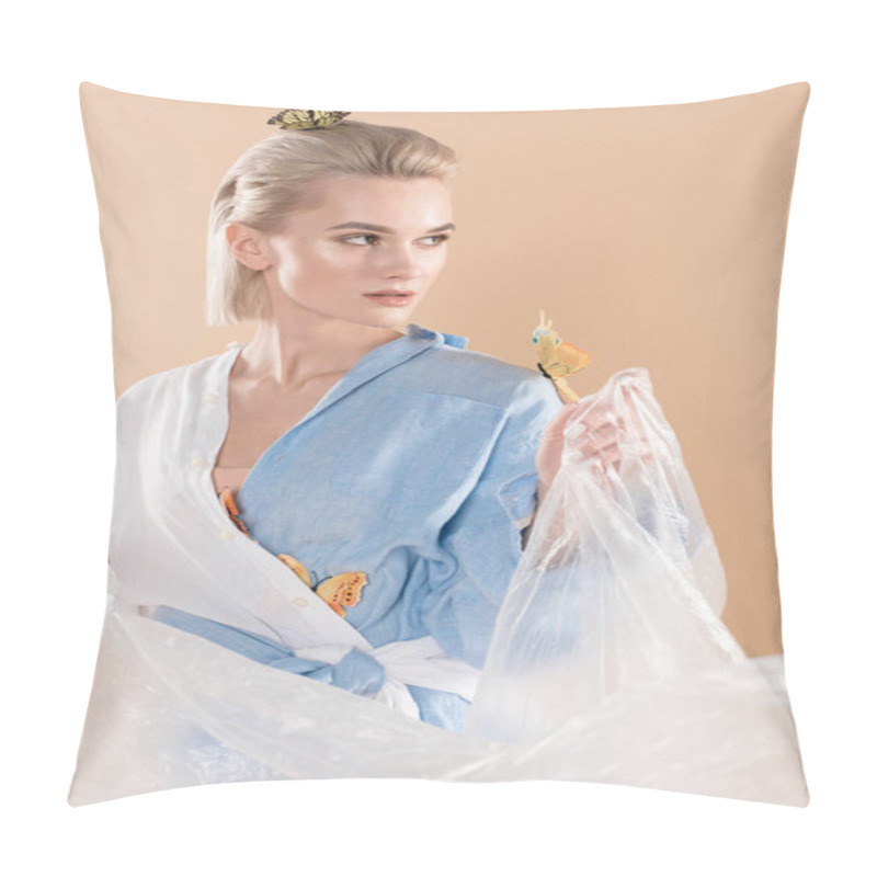 Personality  Attractive Girl Holding Polyethylene While Standing With Butterflies On Eco Clothing Isolated On Beige, Environmental Saving Concept  Pillow Covers