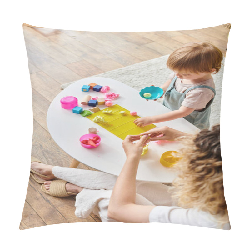 Personality  A Curly Mother And Her Toddler Daughter Engrossed In Playing With Toys On A Table Using The Montessori Method Of Education. Pillow Covers