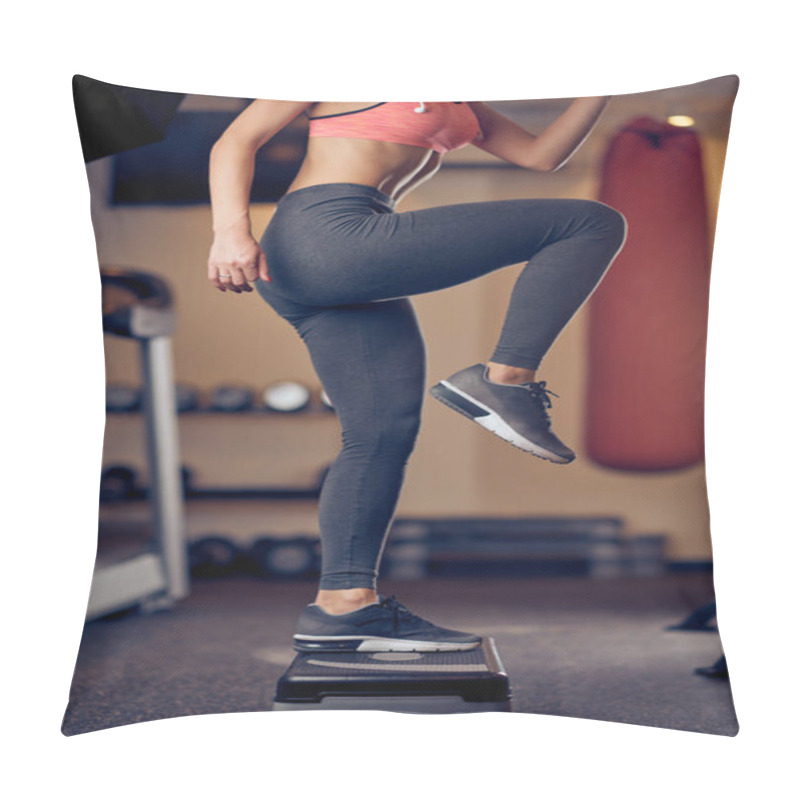 Personality  Smiling Caucasian Blonde Woman With Ponytail In Sportswear Doing Exercises On Steps . Gym Interior, Healthy Lifestyle Concept. Pillow Covers