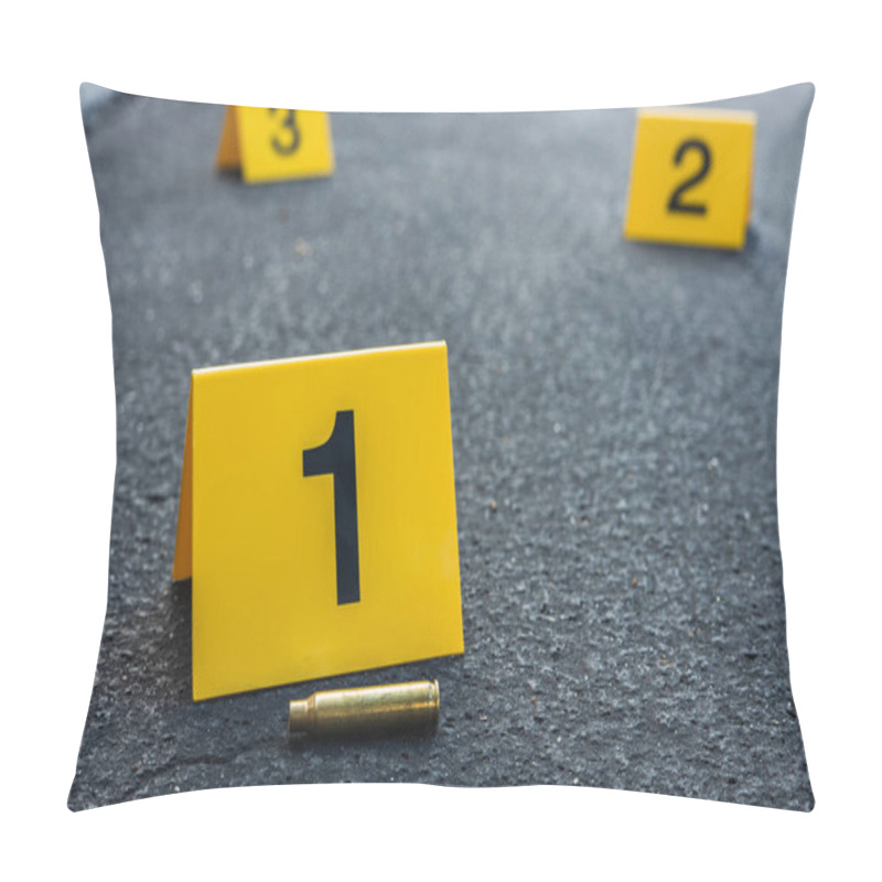 Personality  A Group Of Yellow Crime Scene Evidence Markers On The Street After A Gun Shooting Brass Bullet Shell Casing Rifle Pillow Covers