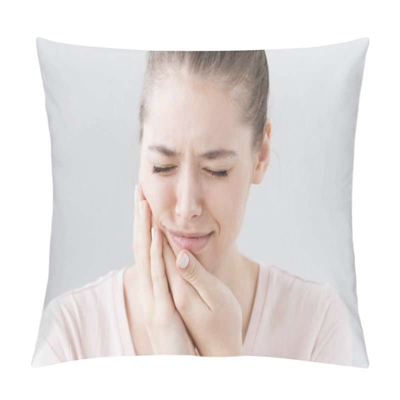 Personality  Closeup Of Beautiful Teenage Girl Isolated On Gray Background Touching Her Face And Closing Eyes With Expression Of Horrible Suffer From Health Problem And Aching Tooth, Showing Dissatisfaction. Pillow Covers