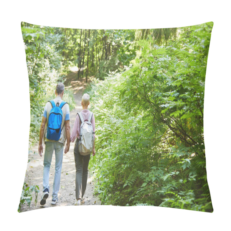 Personality  Rear View Of Senior Couple With Backpacks Holding Hands And Walking In Nature In The Forest, Adventure Trip Pillow Covers