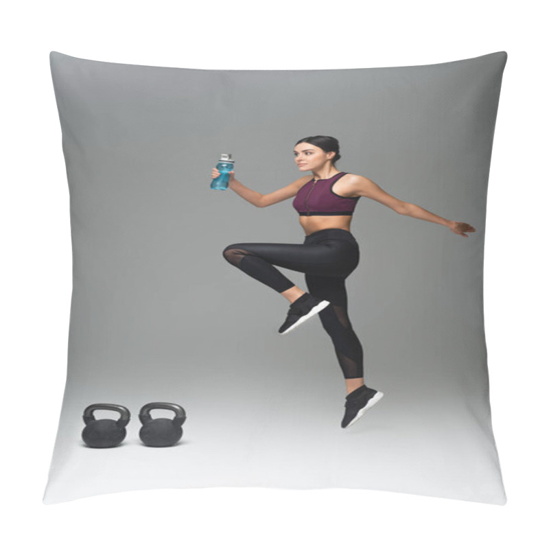 Personality  Young Woman With Sports Bottle Training Near Kettlebells On Grey Background Pillow Covers