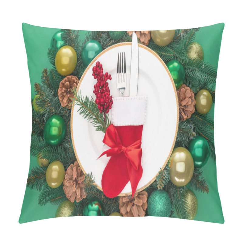 Personality  View From Above Of Fork And Knife In Santa Sock And Red Berries On Plate Surrounded By Evergreen Tree Branches With Christmas Balls Isolated On Green Pillow Covers