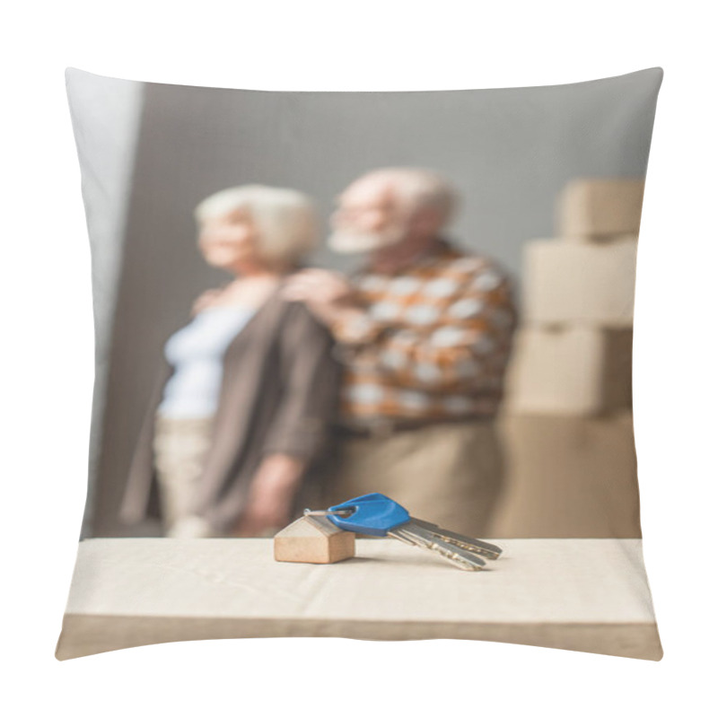 Personality  Blurred View Of Senior Couple Moving Into New House And Keys On Foreground, Moving Concept Pillow Covers