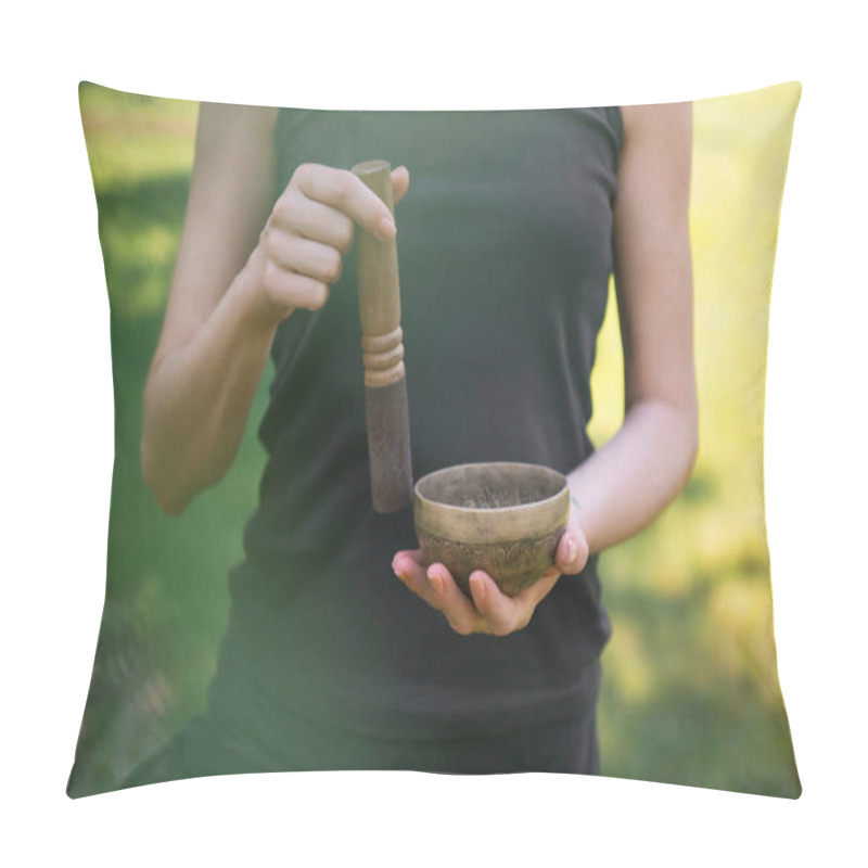 Personality  Cropped Image Of Woman Making Sound With Tibetan Singing Bowl In Park Pillow Covers