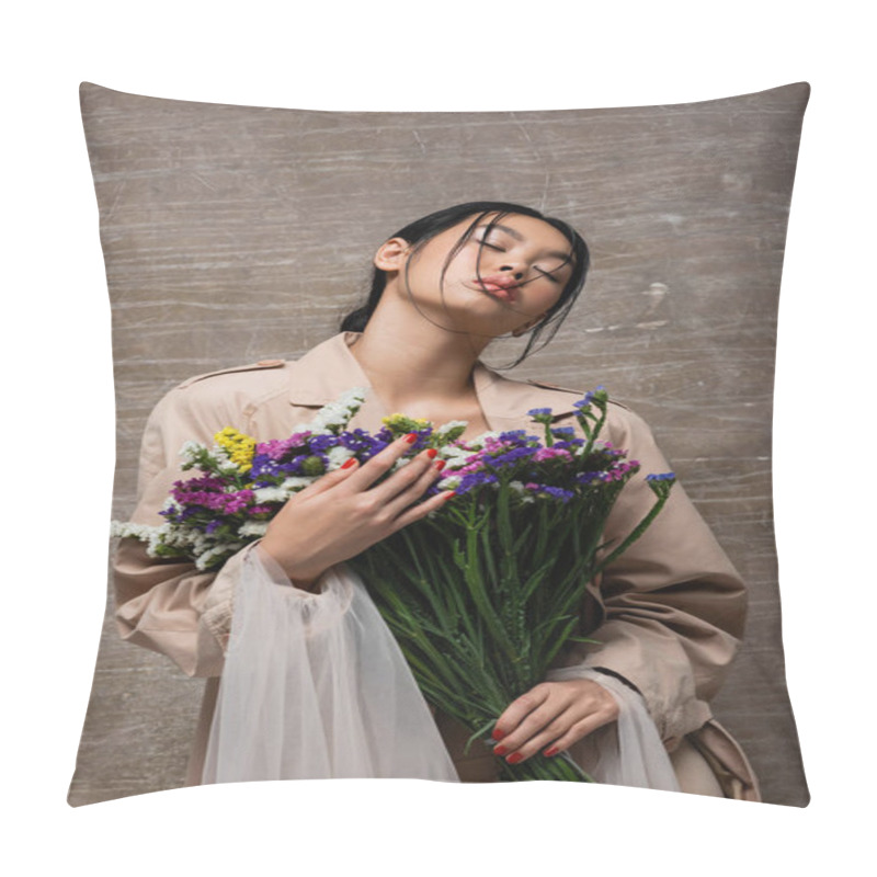 Personality  Low Angle View Of Stylish Asian Woman In Trench Coat Holding Wildflowers On Abstract Brown Background  Pillow Covers