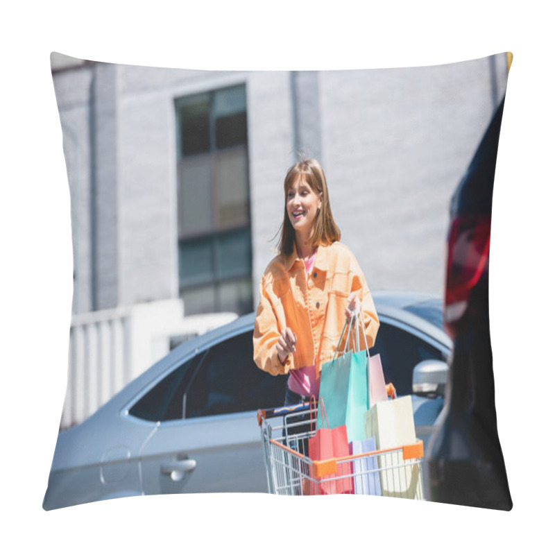 Personality  Selective Focus Of Woman Holding Shopping Bags Near Cart And Cars On Parking  Pillow Covers