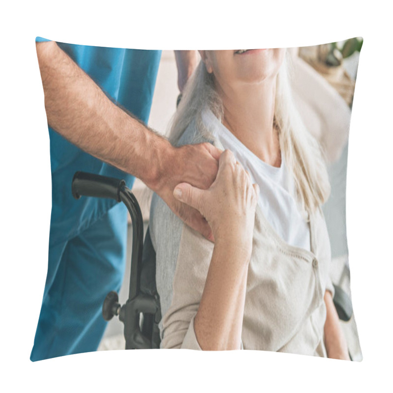 Personality  Cropped Shot Of Smiling Senior Woman In Wheelchair Holding Hand Of Caregiver Pillow Covers