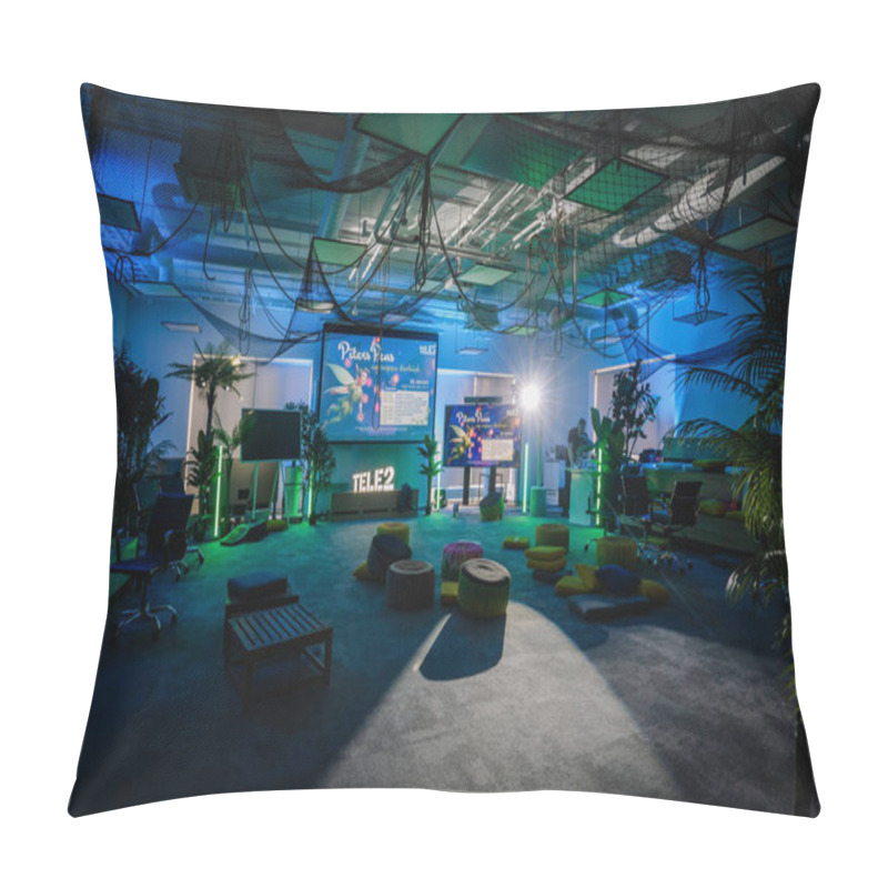 Personality  Riga, Latvia - October 25, 2024 -  A Peter Pan-themed Event Space With Vibrant Lighting, Cushions, And Large Screens Displaying PETER PAN PARTY Visuals. The Room Is Decorated With Nets And Plants. Pillow Covers