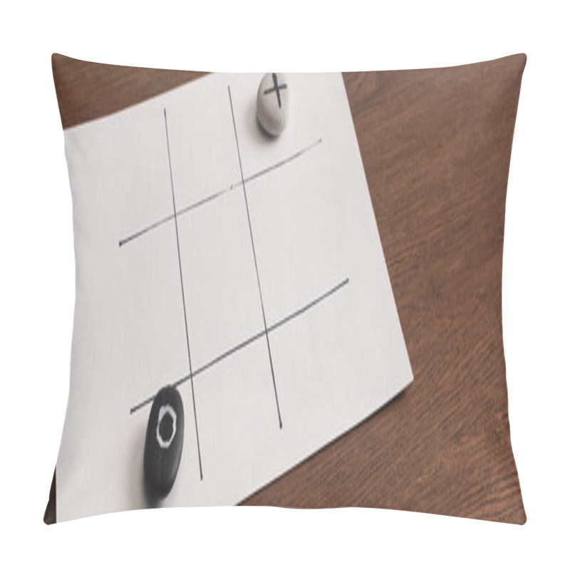 Personality  Panoramic Shot Of Tic Tac Toe Game On White Paper With Pebbles Marked With Naught And Cross On Wooden Surface Pillow Covers