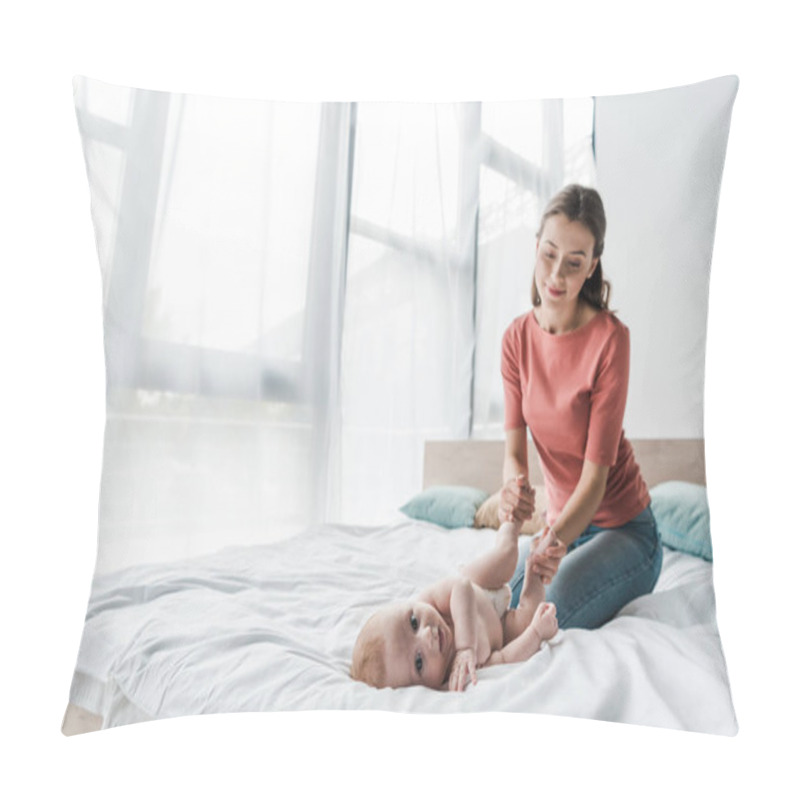 Personality  Selective Focus Of Adorable Infant Looking At Camera Near Mother  Pillow Covers