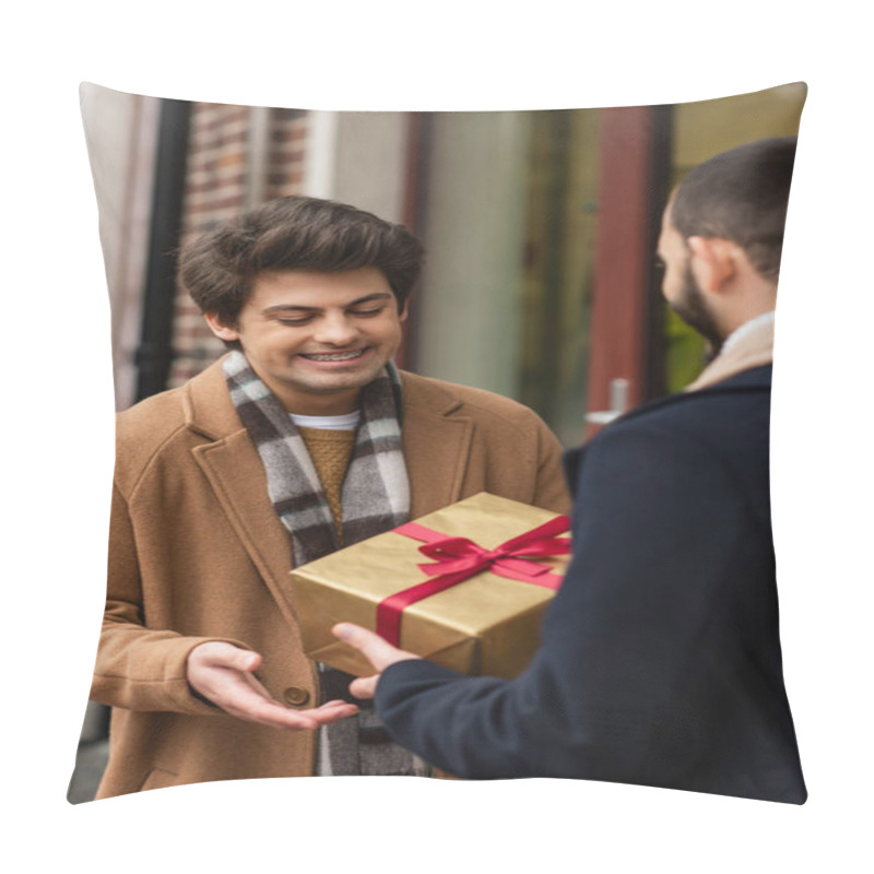 Personality  Pleased Gay Man In Trendy Clothes Smiling Near Blurred Boyfriend With Christmas Present On City Street Pillow Covers