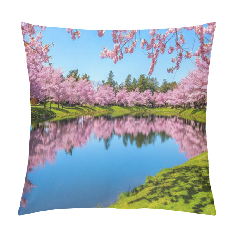 Personality  Spring Haven: A Tranquil Field Of Cherry Blossoms Surrounds A Crystal-clear Pond Under A Soft Morning Sky, Blending Pastel Shades Of Pink, Orange, And Blue. Scattered Petals Float Gently On The Water. Pillow Covers