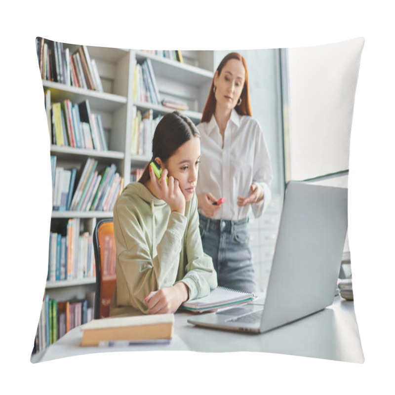 Personality  A Focused Tutor, A Redheaded Woman, Talks On The Phone While Sitting At A Desk With A Laptop During An After-school Lesson. Pillow Covers