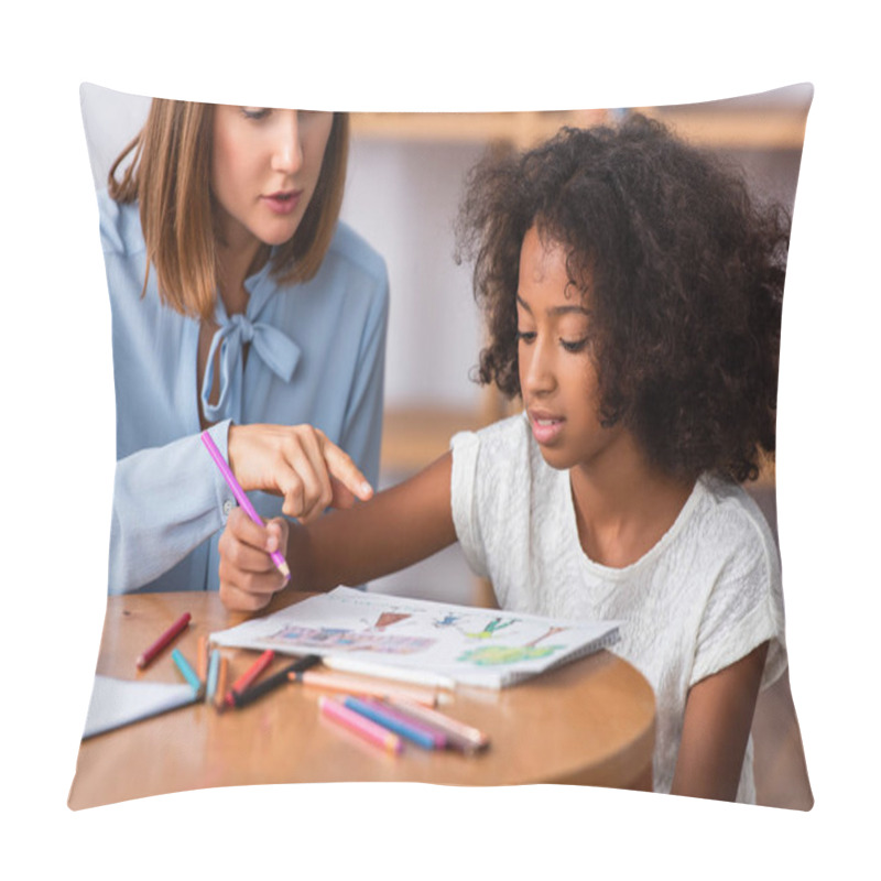 Personality  Psychologist Pointing With Finger At Picture Near African American Girl With Colored Pencil At Coffee Table On Blurred Background Pillow Covers