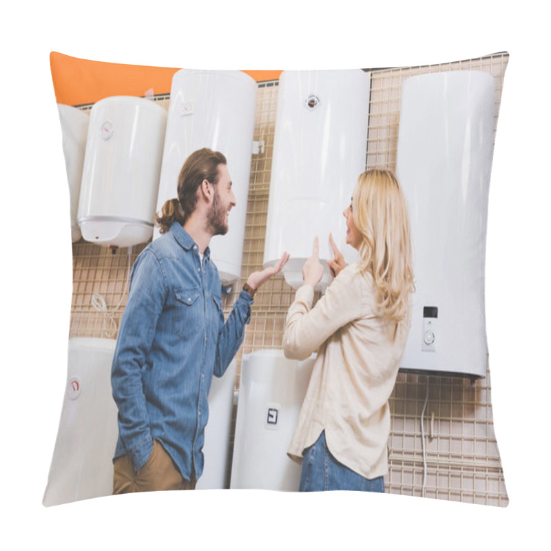 Personality  Smiling Boyfriend Pointing With Hand And Girlfriend Pointing With Fingers At Boiler In Home Appliance Store  Pillow Covers