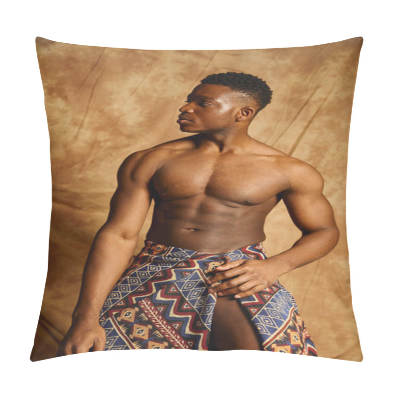 Personality  A Young And Fit African American Man Stands Topless, Showcasing His Physique. Draped In Colorful Fabric, He Gazes Thoughtfully To The Side, Immersed In The Creative Atmosphere Of The Studio. Pillow Covers