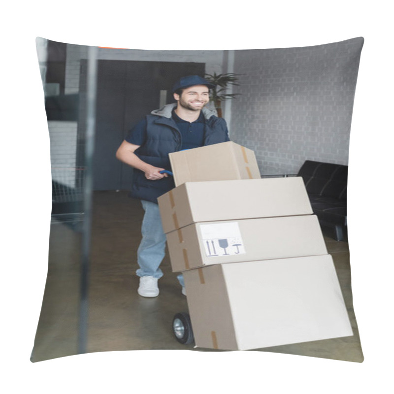 Personality  Positive Courier Standing Near Cart With Packages In Hallway  Pillow Covers