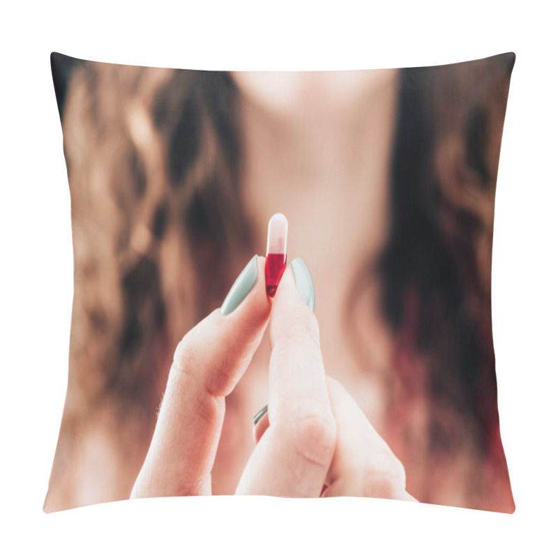 Personality  partial view of woman showing pill in hand pillow covers