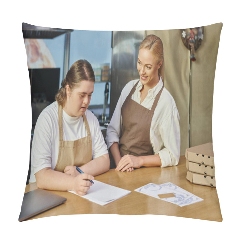 Personality  Female Administrator Smiling Near Employee Woman With Down Syndrome Writing Order On Counter In Cafe Pillow Covers