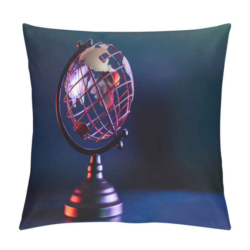 Personality  Metallic Model Of A Globe With Map In Blue And Red Neon Light. Bipolarity Of The World. Geography Concept. Selective Focus, Copy Space Pillow Covers