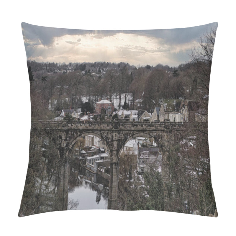 Personality  Stone Viaduct Spanning A River, With Snow-dusted Houses And Trees Visible Behind.  Overcast Sky With Sun Rays Breaking Through In Knaresborough, UK Pillow Covers