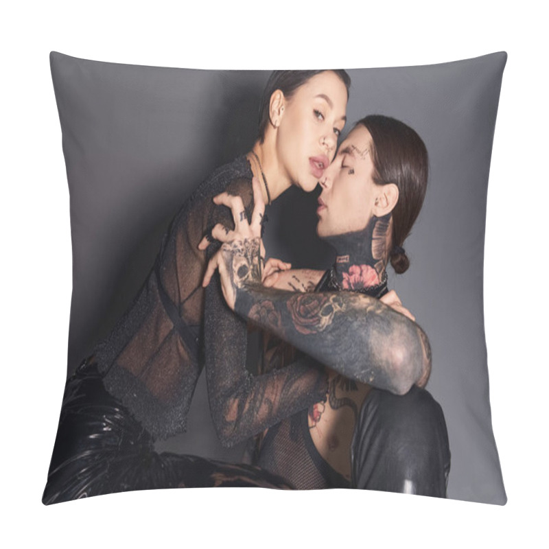 Personality  Two Young Stylish Women With Tattoos Sitting Closely Together In A Studio Against A Grey Background. Pillow Covers