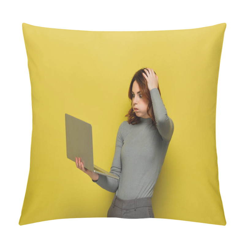 Personality  Shocked Woman With Curly Hair Puffing Cheeks While Holding Laptop On Yellow Pillow Covers