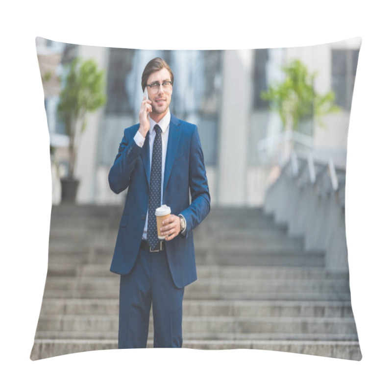 Personality  Smiling Young Businessman In Stylish Suit With Coffee To Go Talking By Phone On Stairs Near Business Building Pillow Covers