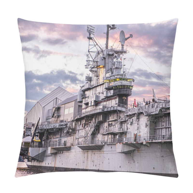 Personality  Features A Historic Aircraft Carrier Docked In Harbor During A Stunning Sunset. The Dramatic Sky And Clouds Accentuate The Impressive Maritime Architecture And Naval Engineering Of The Vessel. Pillow Covers