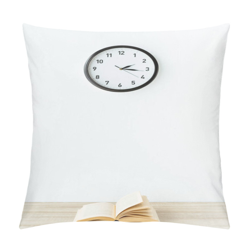 Personality  Old Book On Wooden Tabletop In Front Of White Wall With Hanging Clock Pillow Covers