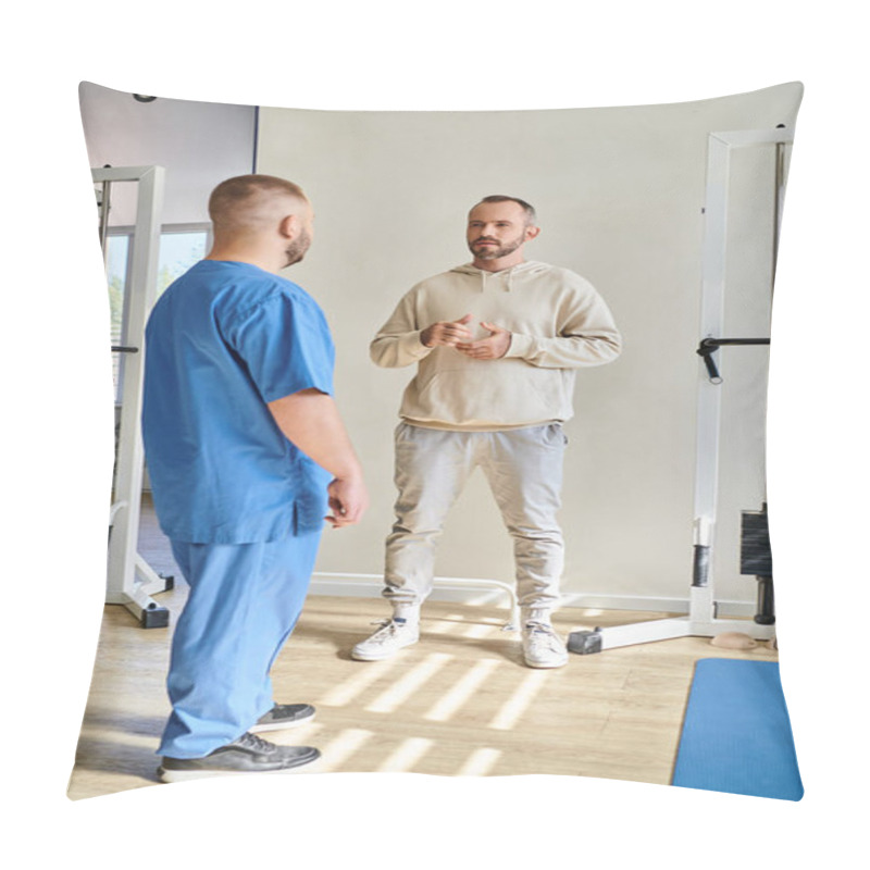 Personality  Handsome Man Discussing Treatment Plan With Doctor In Blue Uniform In Recovery Kinesio Center Pillow Covers